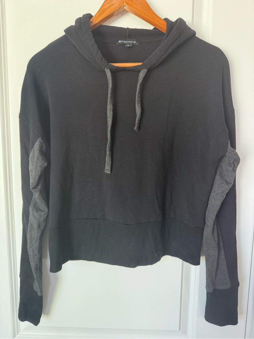 Beyond Yoga Black Hoodie with Gray Sleeve Panels